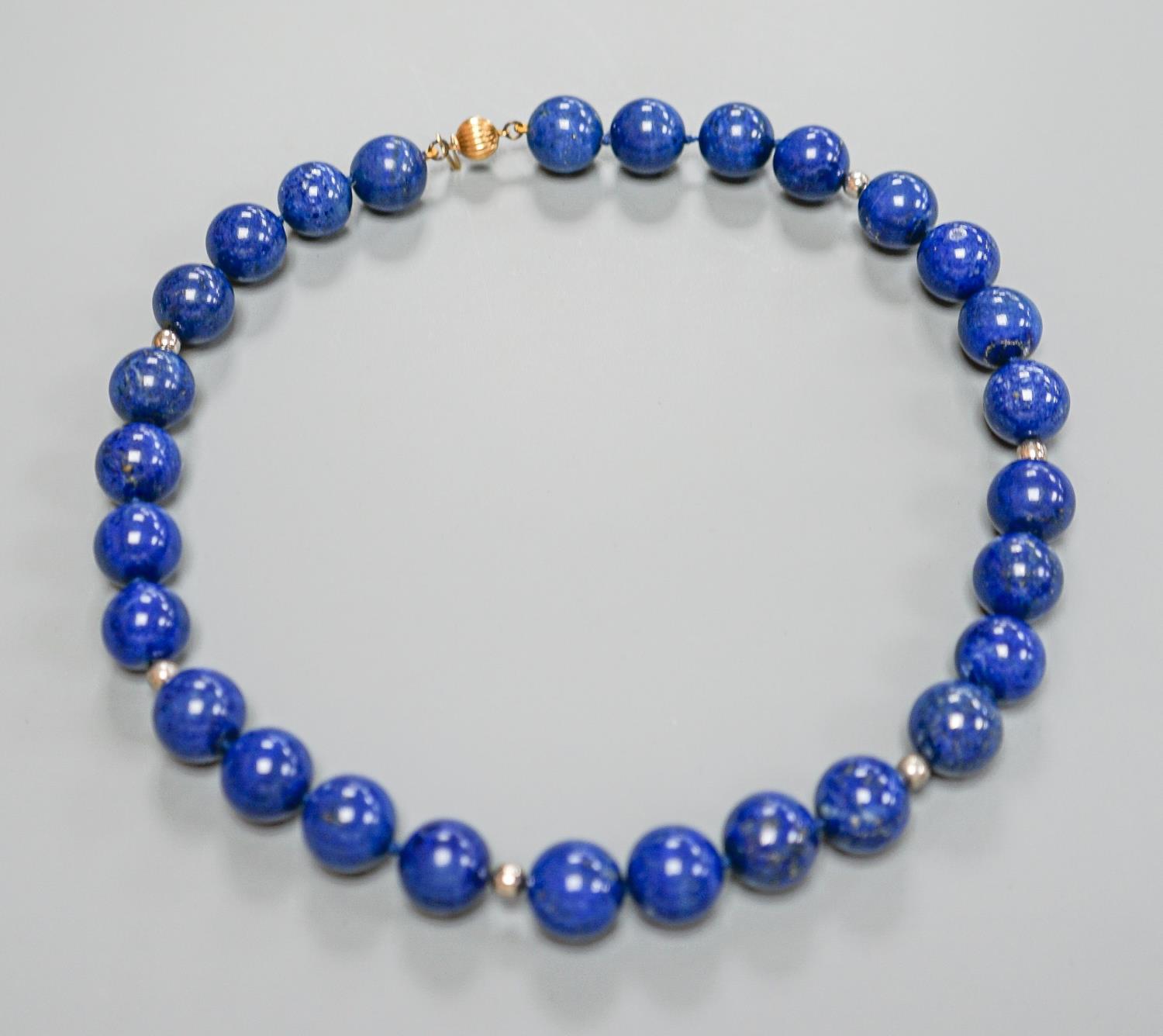 A single strand lapis lazuli circular bead necklace, with 375 clasp, 44cm. - Image 2 of 3