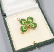A yellow metal, two colour enamel and single stone diamond set clover pendant brooch, width 27mm,