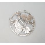A Georg Jensen sterling circular 'two butterflies on flower' pendant, designed by Arno Malinowski,