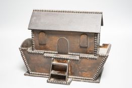 A late 19th century/early 20th century stained plywood Noah’s Ark money box 25cm