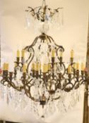 An 18th century style bronzed metal, cut glass 30 light chandelier by Christopher Wray,