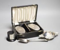 A cased pair of silver clothes brushes, silver quaich-type trophy and a George III silver dessert