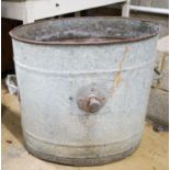 A galvanised metal tub, width 66cm height 60cm
