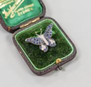 A modern 18ctwhite gold, pave set sapphire and diamond set butterfly brooch, 25mm, gross weight 4.