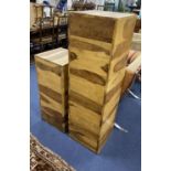 Two olive wood wooden plinths, larger height 122cm