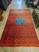 A Gabbah Kelim red ground carpet, 300 x 200cm
