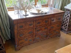 A mid 18th century crossbanded oak mule chest, with rising top and six dummy drawers over three base