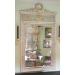 A late 19th century French blue and white painted gesso wall mirror, with laurel and floral basket