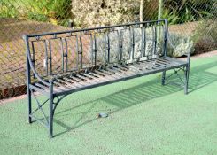 A green painted wrought iron garden bench, W.204cm D.49cm H.87cm