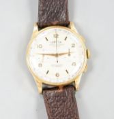 A gentleman's Swiss yellow metal Coresa manual wind chronograph wrist watch (back missing), case