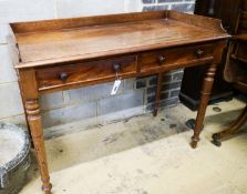 A Victorian mahogany two drawer side table stamped "Wilkinson Great Queens St", width 105cm, depth