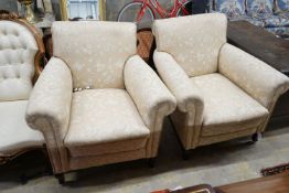 A pair of late Victorian upholstered armchairs, width 90cm, depth 84cm, height 94cm