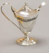 A late Victorian pierced and engraved silver vase shaped pedestal mustard, Nathan & Hayes,