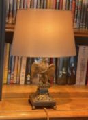 A 19th century Empire style bronze and ormolu model of an eagle, now mounted as a table lamp, height