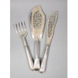 A pair of Victorian silver fish servers with loaded handles, Sheffield, 1853 and a Victorian