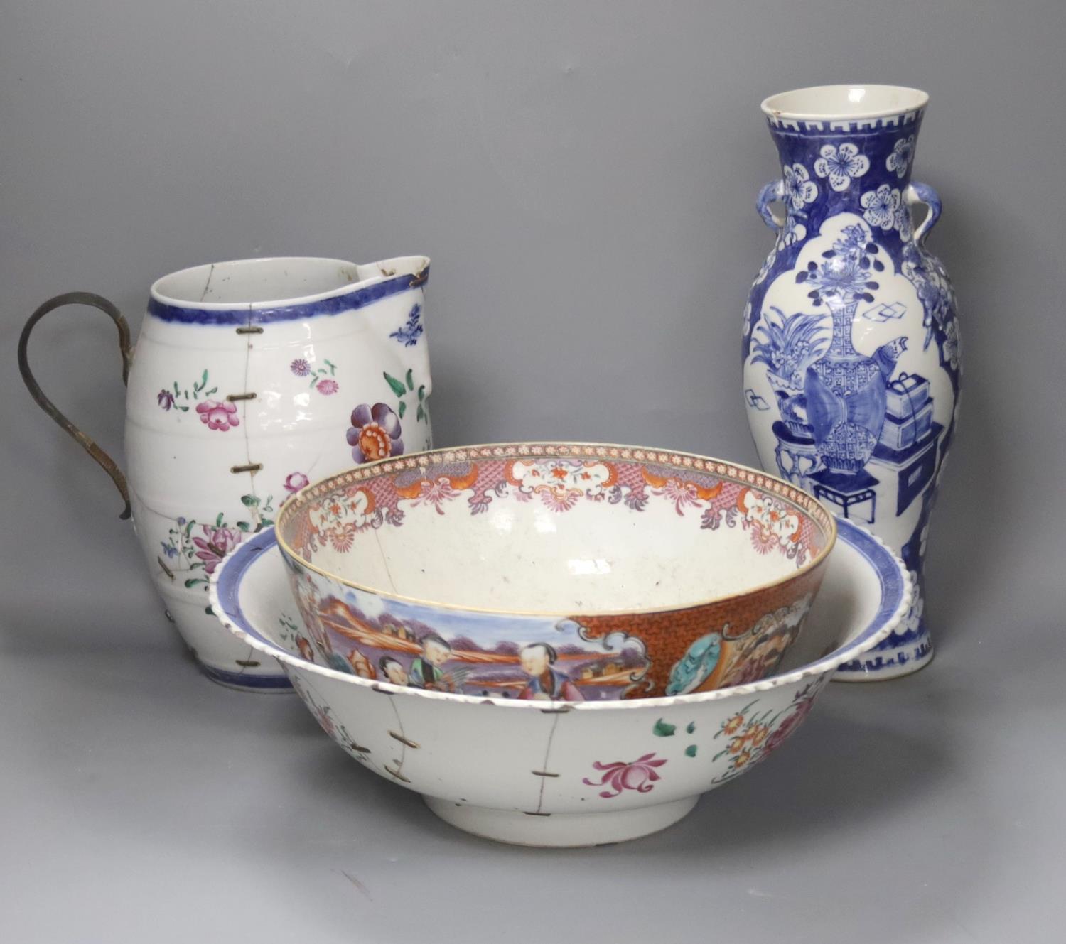 A Chinese Jiaqing export porcelain toilet jug and basin, a small punch bowl, and a blue and white