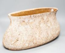 A large rustic terracotta vessel of boat form 45cm