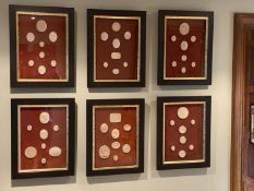 A collection of thirty four framed reproduction plaster intaglios, on velvet backing with parcel