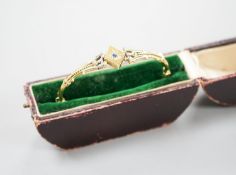 An Edwardian 9ct and gem set hinged bracelet (a.f.), gross weight 5.5 grams.