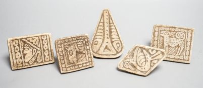 A group of five Middle eastern ceramic moulds/stamps