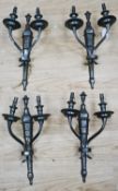 A set of four patinated brass wall lights 48cm