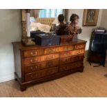 A modern Georgian style mahogany nine drawer chest, width 153cm depth 49cm height 75cm