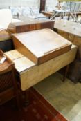 A red walnut clerk's desk and an oak Pembroke table