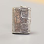 A George III engraved silver vinaigrette, modelled as a satchel, John Shaw, Birmingham, 1816, 31mm.