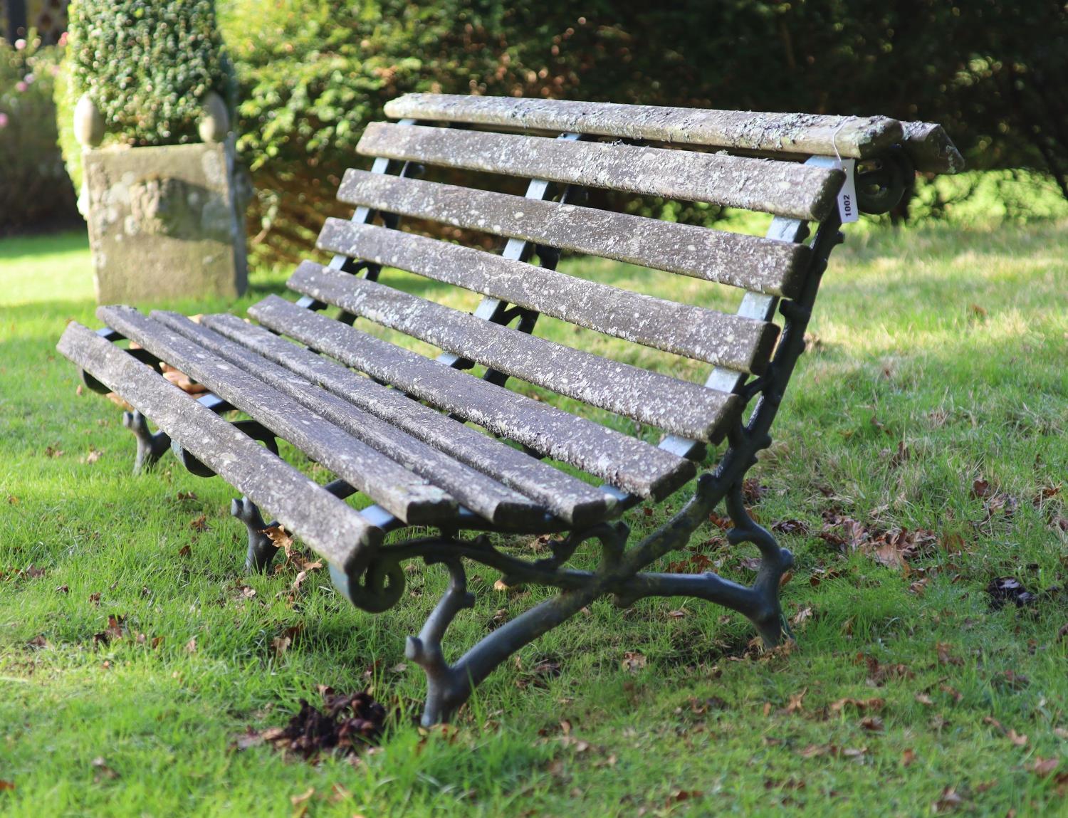 A pair of Coalbrookdale style cast iron and slatted teak garden benches, width 165cm depth 77cm - Image 2 of 4