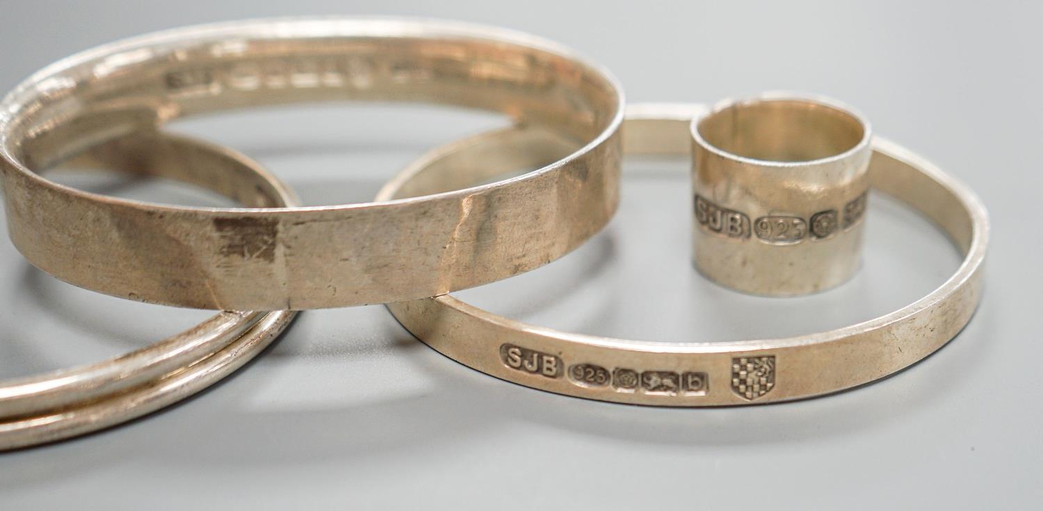 Three modern silver bangles and a large silver band, all by Simon J. Beer of Lewes,191 grams, ring - Image 4 of 5
