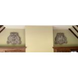 A pair of grey painted composition wall masks, width 80cm height 88cm