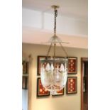 A cut and etched glass hurricane style ceiling light, height 54cm diameter 30cm, fitted for