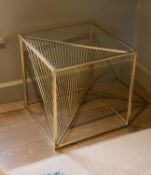 A pair of gold painted metal glass top occasional tables, with wirework underframes, width 52cm