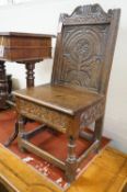 An 18th century oak box seat chair, width 46cm, depth 38cm, height 98cm
