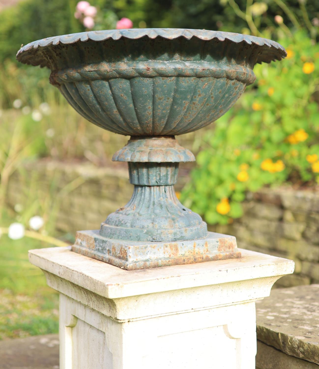A pair of green painted cast iron garden urns on reconstituted stone pedestals, diameter 52cm height - Image 2 of 5