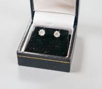 A pair of 18ct white metal and solitaire diamond ear studs, gross weight 2.4 grams,total diamond