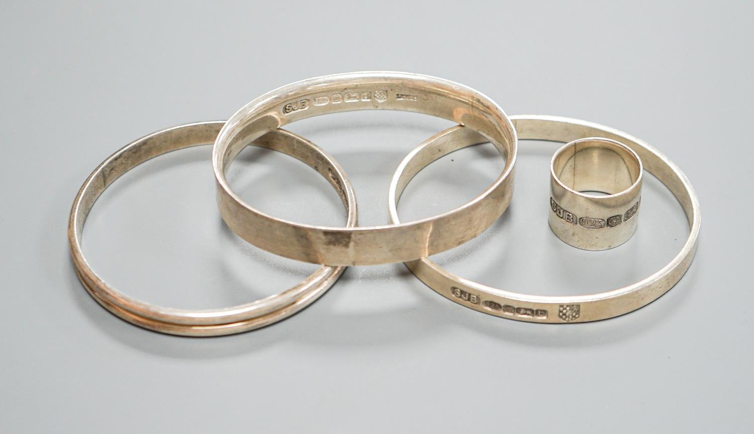 Three modern silver bangles and a large silver band, all by Simon J. Beer of Lewes,191 grams, ring - Image 2 of 5