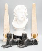 A pair of composition classical faux marble obelisks together with a pair of simulated stone Sphinx,