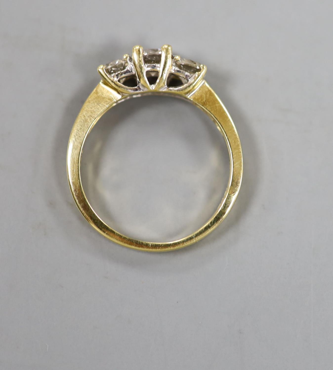 A modern 18ct gold and three stone diamond ring, size M, gross weight 3.4 grams. - Image 3 of 3