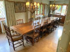 An impressively large 17th century style oak refectory table, with twin plank top on triple baluster