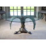 A patinated bronze and glass palm leaf centre table, the circular top 165cm height 75cmPurchased