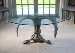 A patinated bronze and glass palm leaf centre table, the circular top 165cm height 75cmPurchased