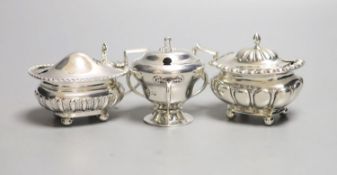 Three assorted 20th century silver mustard pots including Art Nouveau, Birmingham, 1909, tallest