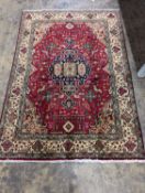 A Tabriz rug, 190 x 137cm