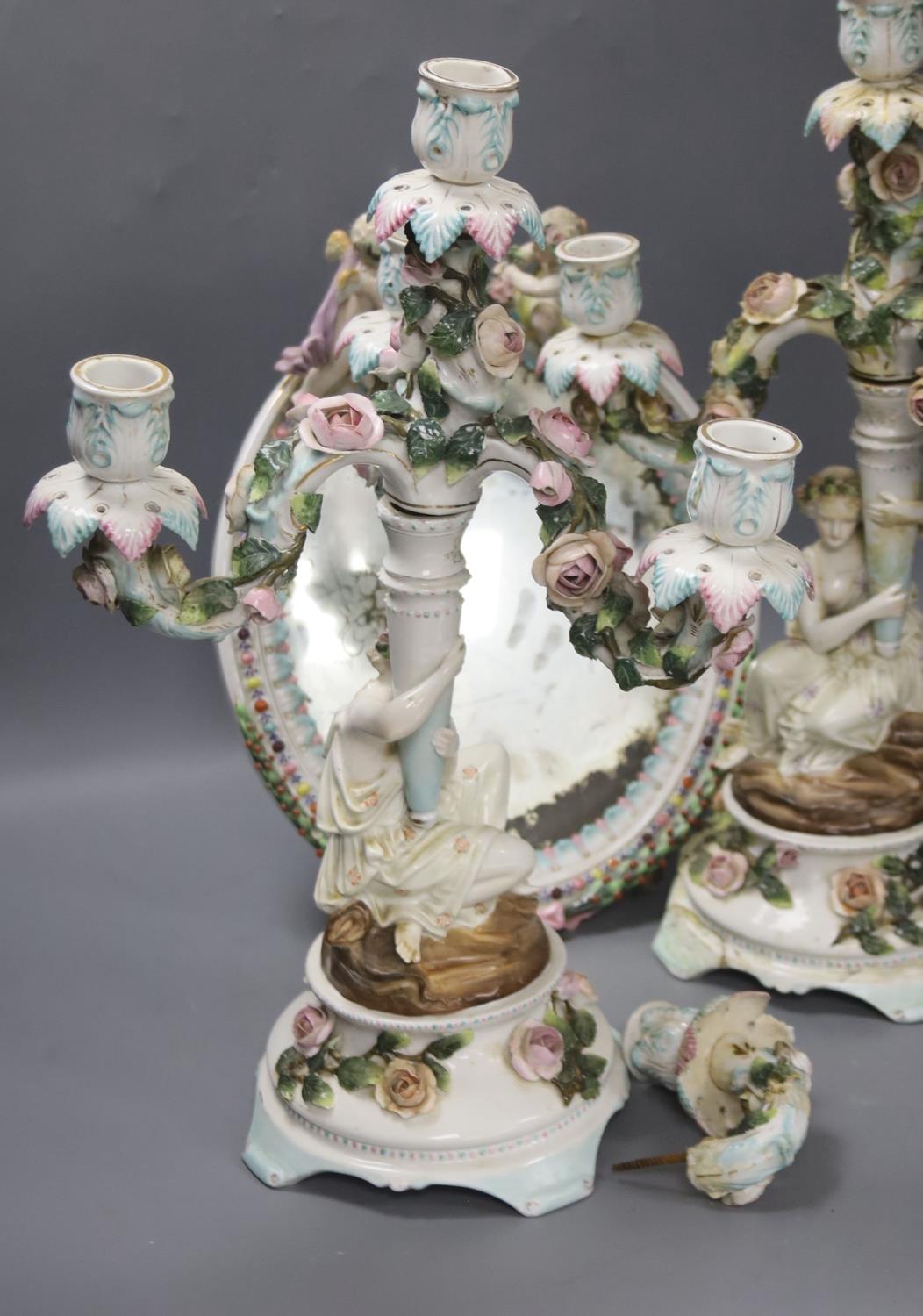 A pair of 19th century German porcelain three branch candelabra (a.f.) and an oval porcelain - Image 4 of 4