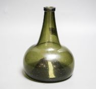 A Dutch green glass ‘onion’ wine bottle, c.1740, 18cm high
