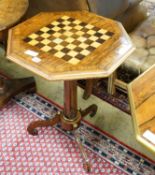A Regency style brass mounted octagonal rosewood tripod games table, width 52cm, height 72cm