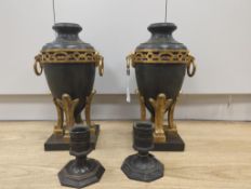 A pair of reproduction twin handled urns, together with a pair of reproduction cast metal