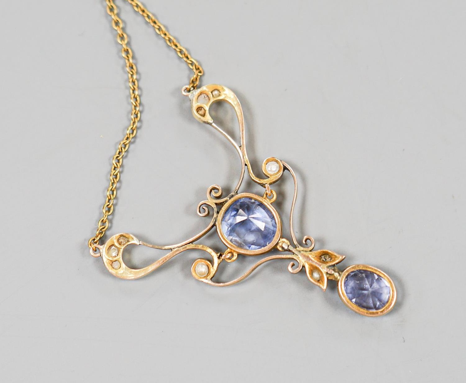 An early 20th century 9ct, two stone Ceylon sapphire and multi seed pearl set pendant necklace, - Image 2 of 2