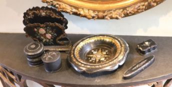 A small collection of Victorian papier mache wares comprising letter rack, bowl and three assorted